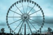 Travel photography:Cyanotype image of Place de la Concorde in Paris with ferris wheel and obelisk, France
