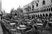 Travel photography:Tables outside a café in Piazza San Marco in Venice, Italy