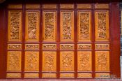 Travel photography:Ornately carved wooden doors in Lijiang , China