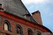 Travel photography:Roof detail of the Holstentor (city gate) in Lübeck , Germany