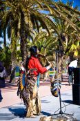 Travel photography:Busker at the Barcelona beach front, Spain