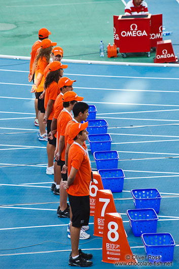 Helpers at the start of the 100m Semi-final