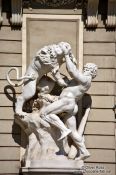 Travel photography:Sculpture of heracles fighting the Nemean Lion in  in Vienna´s Hofburg , Austria