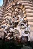 Travel photography:The Macht-zur-See fountain at the Michaeler square outside the Hofburg, Austria