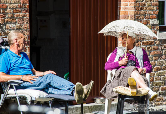 Local residents enjoy a summer day in Bruges