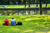 Travel photography:People enjoying summer in a Bruges park, Belgium