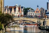 Travel photography:Ghent bridge across canal with houses, Belgium