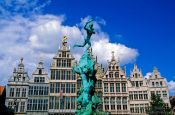 Travel photography:Antwerp Brabo statue with houses, Belgium