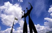 Travel photography:Os Candangos monument on the Praça dos Três Poderes (Square of the three powers) in Brasilia, by artist Bruno Gio, Brazil