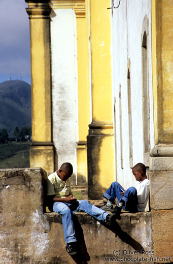 Two boys playing with their mobile phones, Ouro Preto