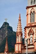 Travel photography:Facade detail of the Igreja da Imaculada Conceiçao in Botafogo with Corcovado, Brazil