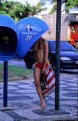 Travel photography:A "big ear" (orelhão) Brazilian phone booth in Rio near Ipanema beach, Brazil