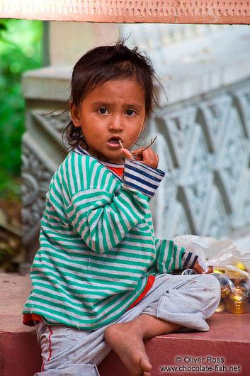 Small girl at Wat Phnom in Phnom Penh