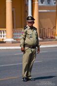 Travel photography:Traffic police outside the Phnom Penh Royal Palace , Cambodia