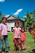Travel photography:Kids outside their home between Sihanoukville and Kampott , Cambodia