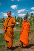 Travel photography:Two buddhist monk novices along the road between Sihanoukville and Kampott , Cambodia