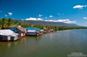 Travel photography:Houses along a river between Sihanoukville and Kampott , Cambodia
