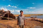 Travel photography:Duck farmer along the road from Sihanoukville to Kampott , Cambodia
