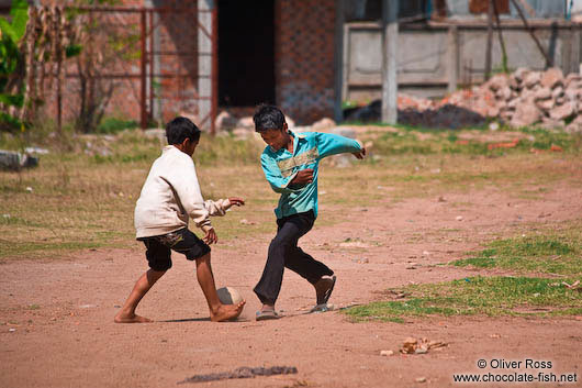 Kids playing football at a temple near Odonk (Udong) 