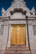Travel photography:Golden door at the large stupa on a hill above the Vipassara Dhara Buddhist Centre near Odonk (Udong), Cambodia