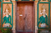 Travel photography:Wooden door at a temple near Odonk (Udong) , Cambodia