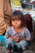 Travel photography:Small girl at the Battambang central market, Cambodia