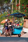 Travel photography:Kitchen and family on wheels in Battambang, Cambodia