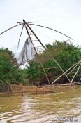 Travel photography:Large fishing net in the Stung Sangker river near Battambang, Cambodia