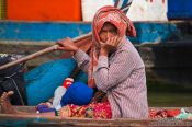 Travel photography:Woman near Tonle Sap lake, Cambodia