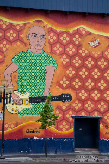Guitar player mural in Montreal