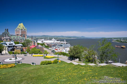 The Château Frontenac castle in Quebec with Terrasse Dufferin promenade and Saint Lawrence river