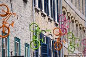 Travel photography:Bicycles on a facade in Quebec´s  lower old town (basse ville), Canada