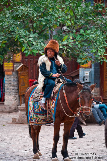 Lijiang man on horse