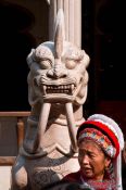 Travel photography:Yuantong temple guardian with Naxi woman in Kunming, China