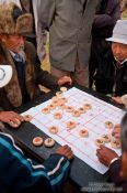 Travel photography:Lijiang men playing , China