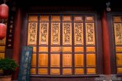 Travel photography:Ornately carved wooden door in Lijiang´s old town, China