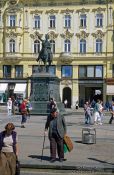 Travel photography:Trg Bana Jelacica (main square) with bronze equestrian statue of Ban Jelacic, Croatia