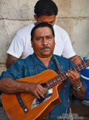 Travel photography:Guitar player in Havana Vieja, Cuba