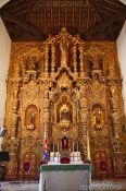 Travel photography:The golden altar inside the Parroquia de San Juan Bautista de Remedios, Cuba