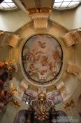 Travel photography:Painted ceiling of a chapel in Prague`s St. Nicolas church , Czech Republic