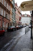 Travel photography:Wet street in Prague`s Lesser Quarter, Czech Republic