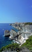 Travel photography:Bonifacio coastline showing the city atop the cliffs, France