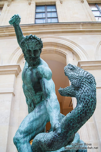 Sculpture of Hercules and the serpent at the Louvre museum in Paris