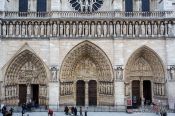 Travel photography:The front portals of Notre Dame cathedral in Paris, France