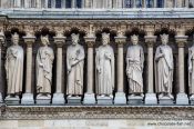 Travel photography:Facade detail of Notre Dame cathedral in Paris, France