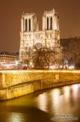 Travel photography:View of river Seine with Notre Dame cathedral by night, France