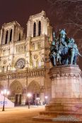 Travel photography:View of Notre Dame cathedral with Charlemagne monument, France