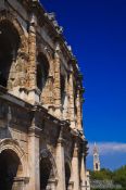 Travel photography:Facade detail of the coliseum in Nimes, France