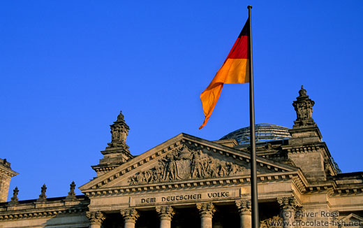The Reichstag with glass cupola and flag