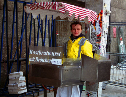 Bratwurst seller outside the Friedrichstrasse station in Berlin